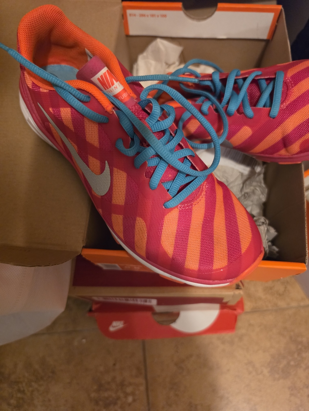 Nike Women's Pink & Orange Running Shoes with Teal Laces